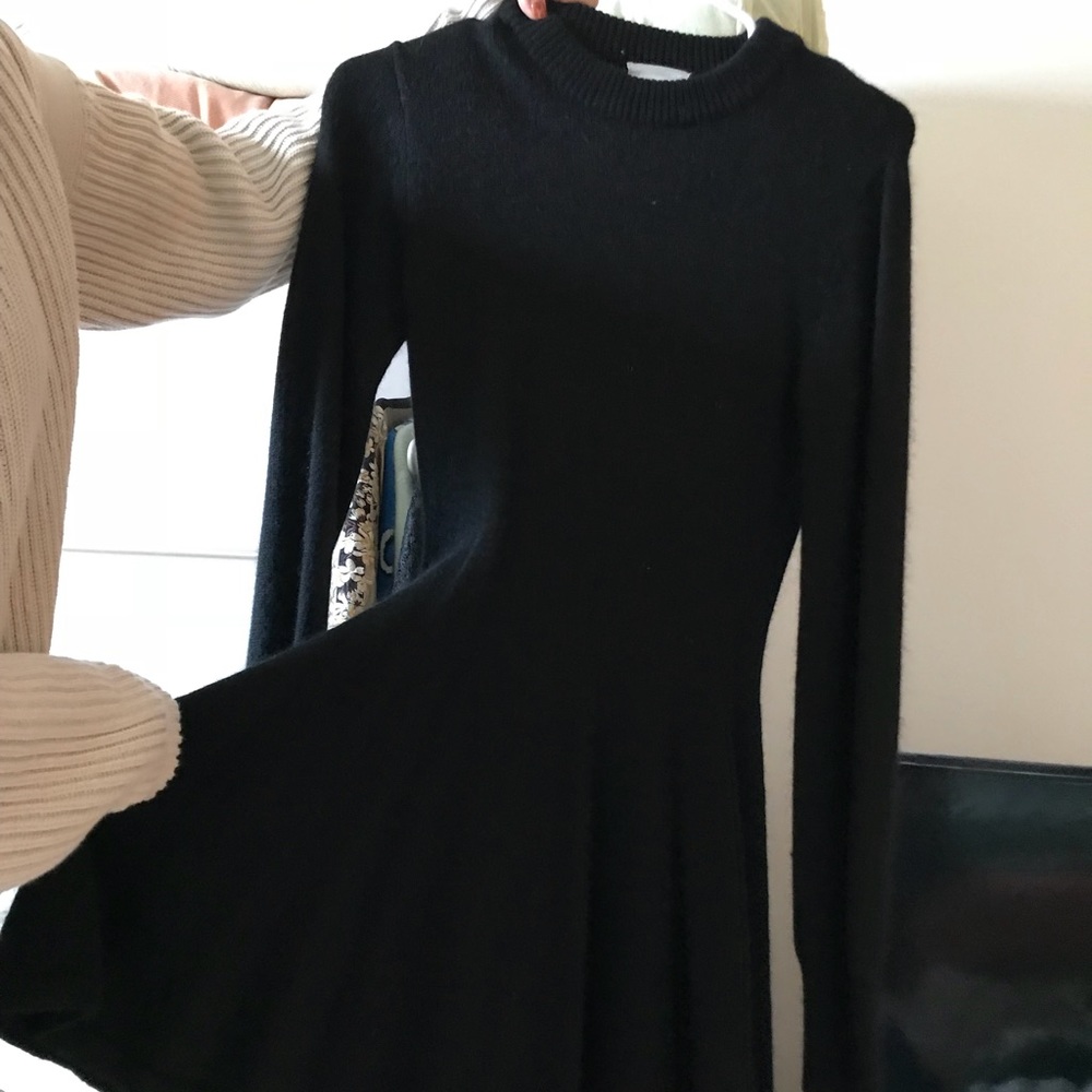 Long sleeve balck sweater dress.